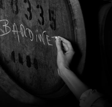 Our cellar master marking bardinet with chalk on our barrels